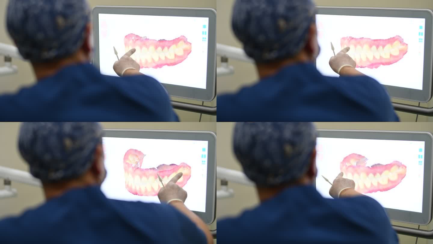 牙科医生在展示3D牙齿状态