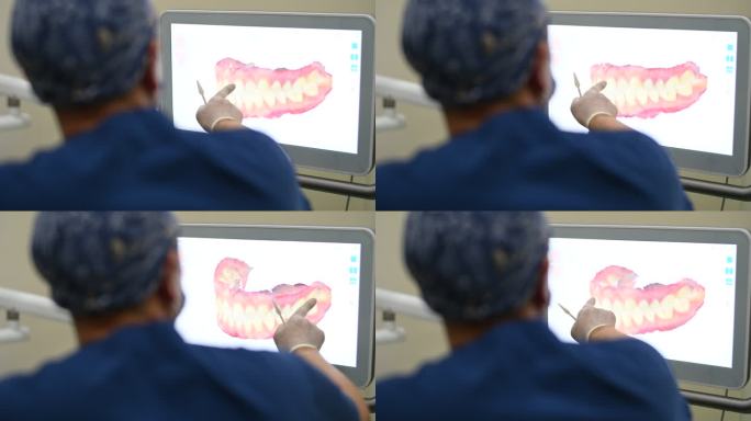 牙科医生在展示3D牙齿状态