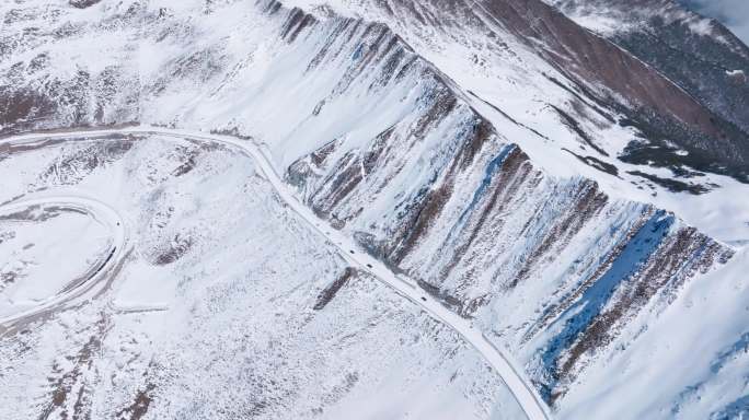 航拍川西美丽雪山风景夹金山下山路盘旋