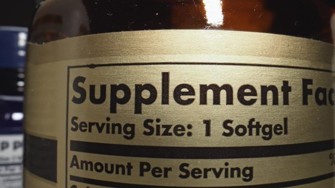营养补充品罐的标签。健康和保健产品的整体福祉。