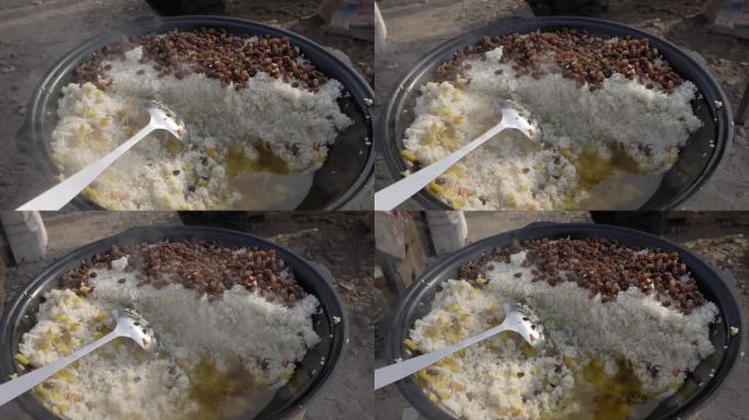 新疆吐鲁番集市美食地摊美食小吃手抓饭粉面