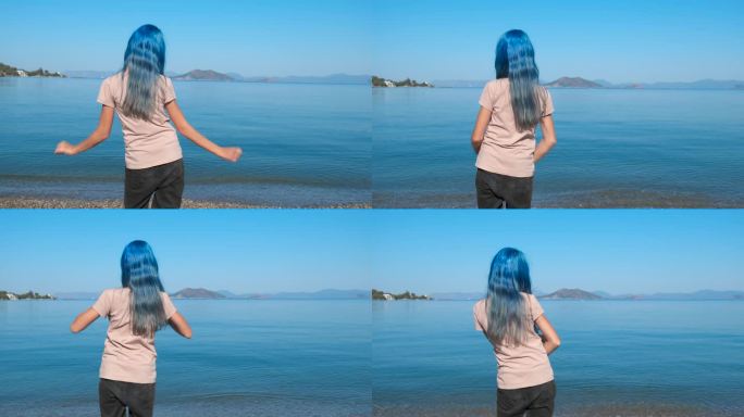 蓝头发的青少年在海湾跳舞。