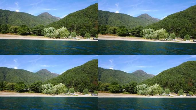 在富士山附近的西子湖划独木舟。平静的水面平静宜人。