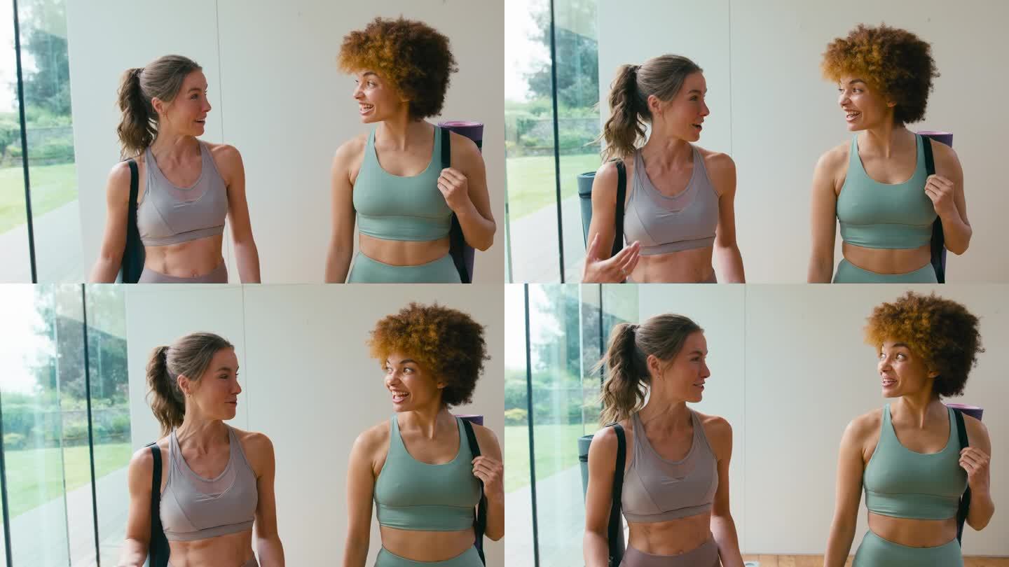 两个女性朋友穿着运动服，带着运动垫去健身房或瑜伽室锻炼
