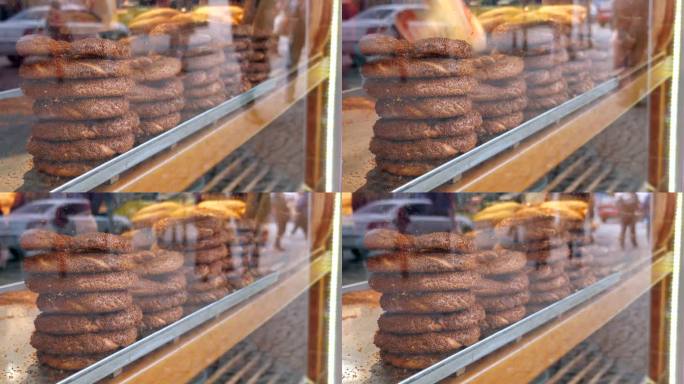 透过商店橱窗向卖土耳其百吉饼的人开枪