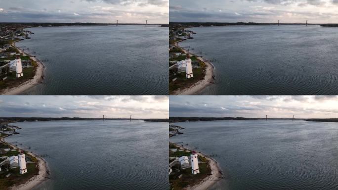航拍的Strib灯塔和桥梁在丹麦海峡之间的菲嫩岛和日德兰半岛。丹麦海岸上的灯塔和桥Den Nye L