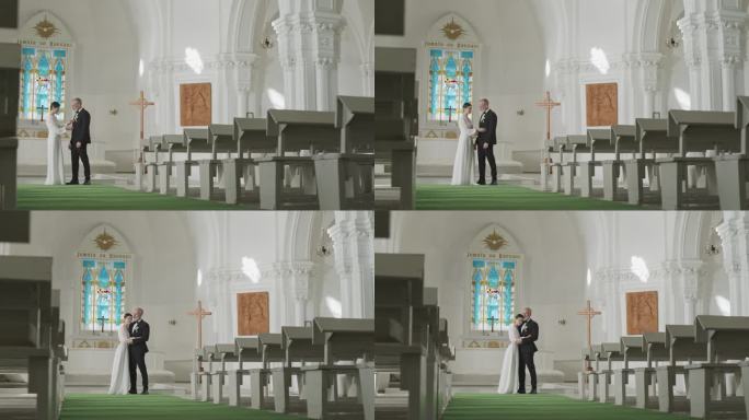 新婚夫妇在婚礼当天在教堂拥抱