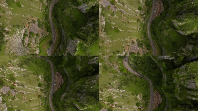 无人机飞过史诗般的B3135公路，穿过门迪普山，沿着著名的切达尔峡谷。自上而下的观点。