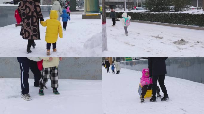 下雪天 家长接孩子们放学 雪地里玩耍