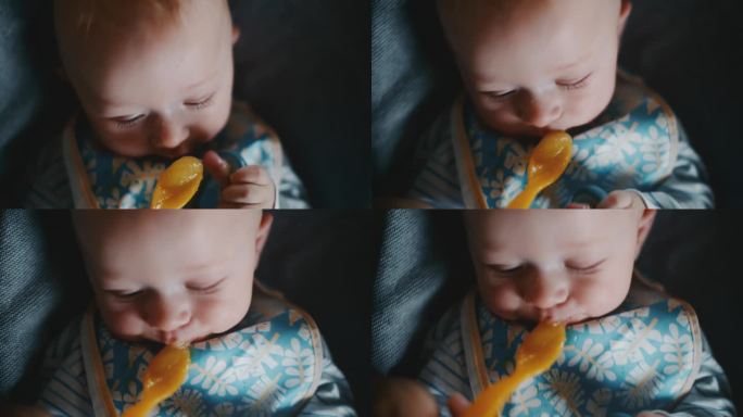 一个可爱的小男孩在家里被妈妈用勺子温柔地喂芒果泥。从容不迫的视角捕捉到了母亲和孩子之间养育的联系。4