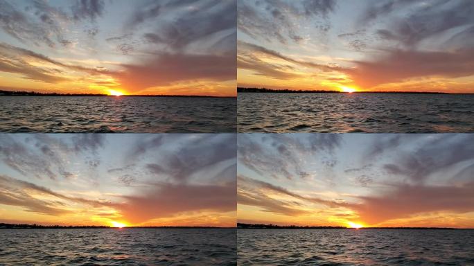 阿拉巴马州奥兰治海滩的十月午后——水上的日落