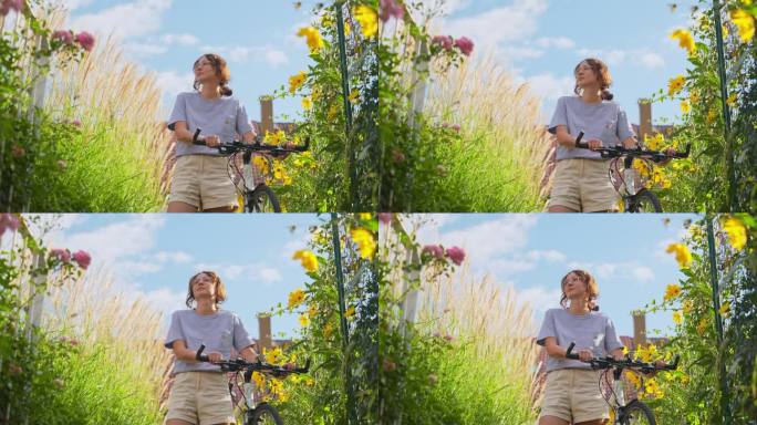 在后院的花丛中骑自行车的女人
