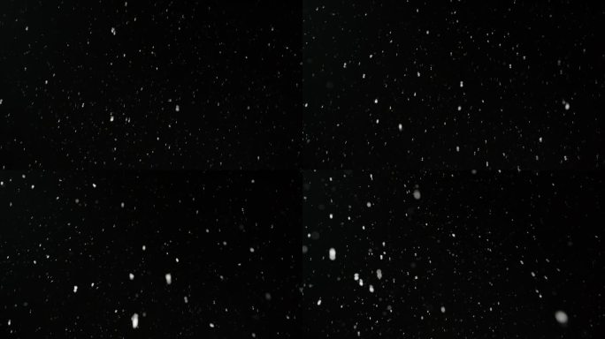 低角度可循环锁定拍摄发光的降雪在夜晚的天空