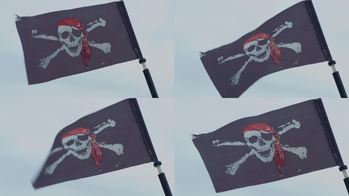 海盗旗骷髅与交叉骨在风中挥舞