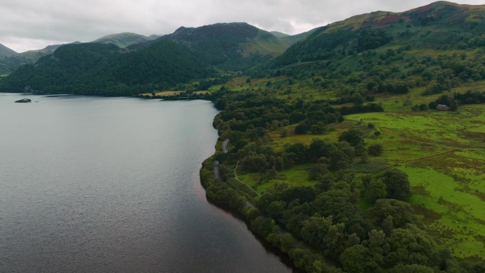史诗级无人机拍摄的深湖区和绿色自然，环绕着湖泊