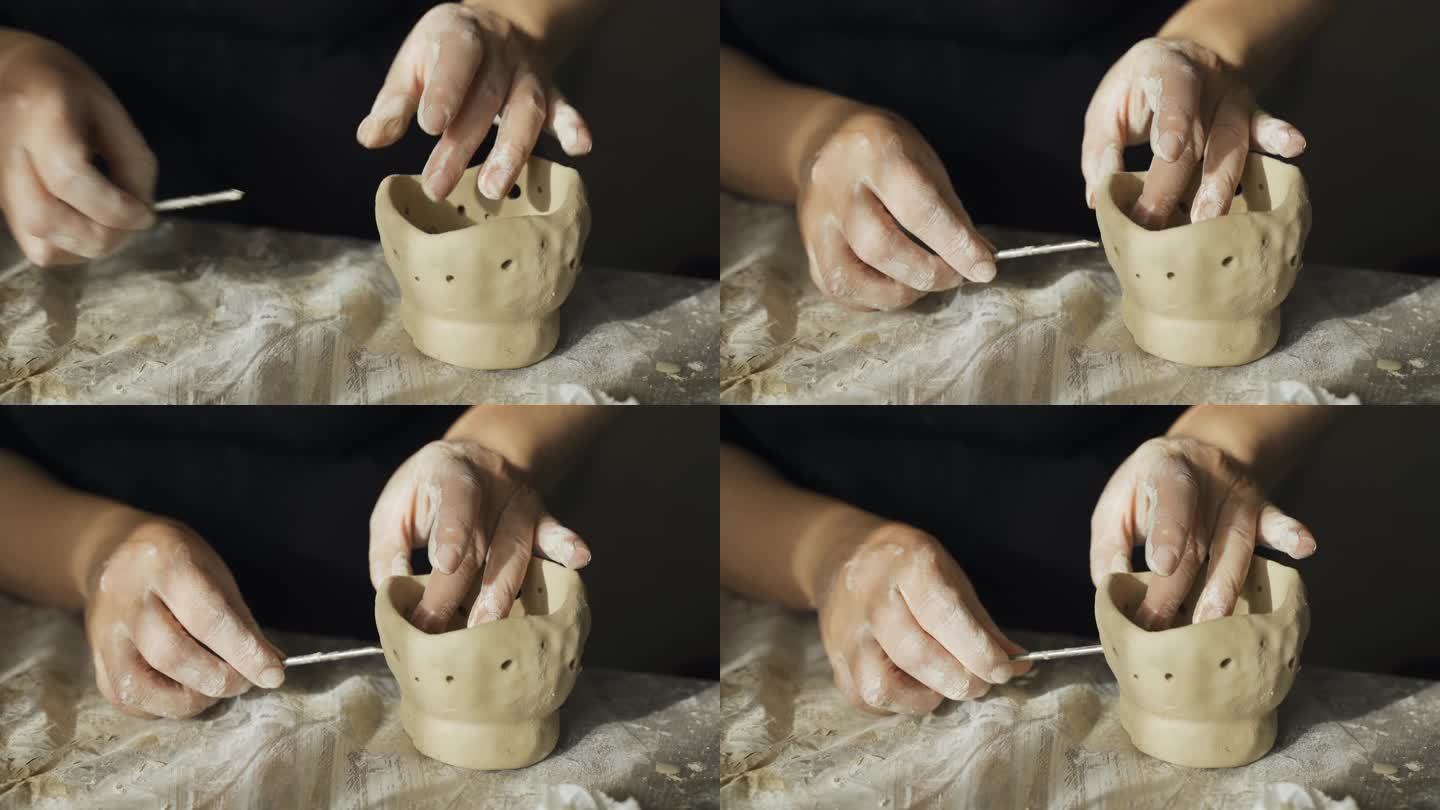 一名妇女用黏土工艺品中的一种工具——烛台打洞。