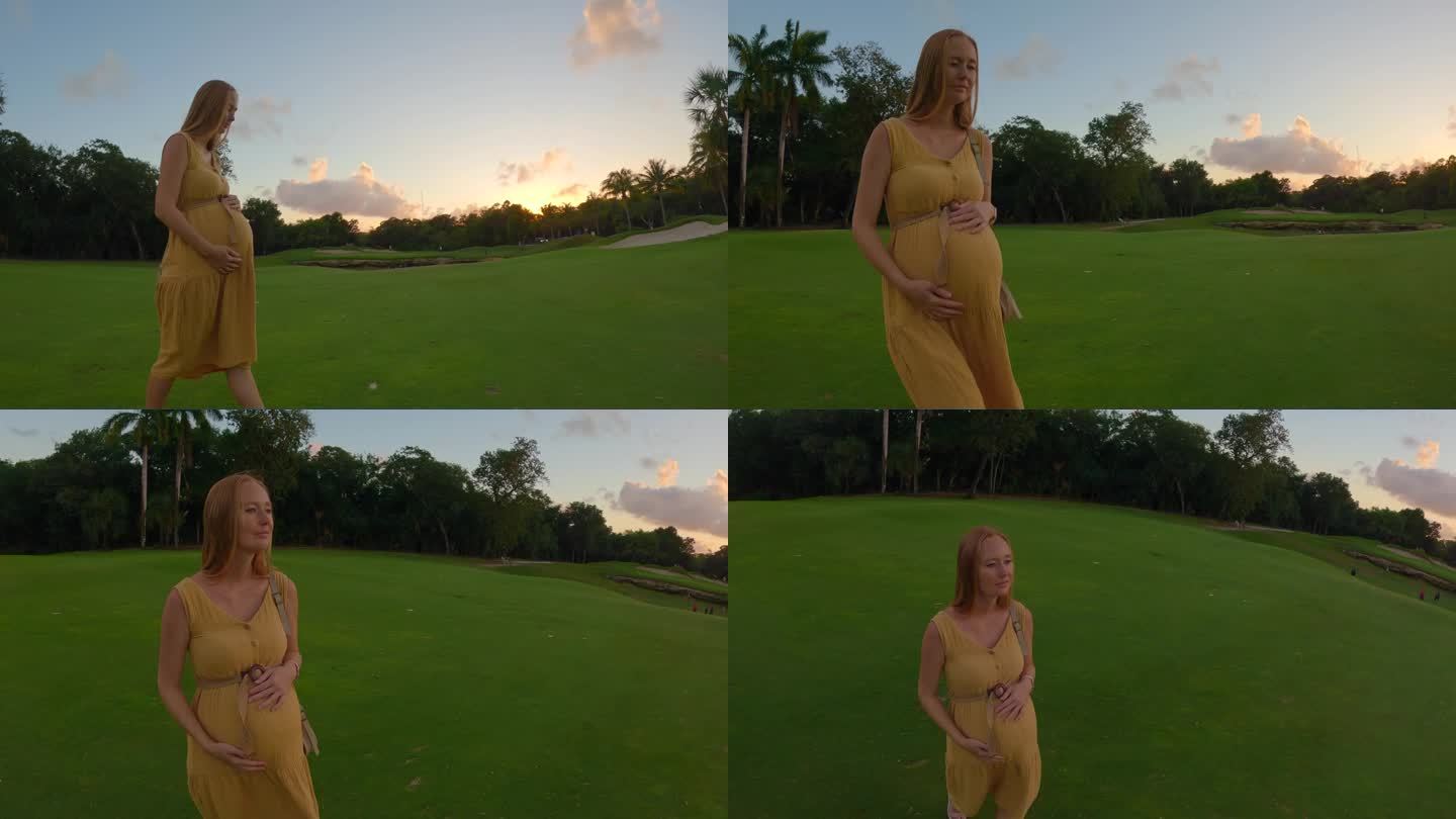 在这个令人着迷的慢动作视频中，一个孕妇优雅地走在充满活力的绿色田野上，被美丽日落的迷人色调照亮。宁静