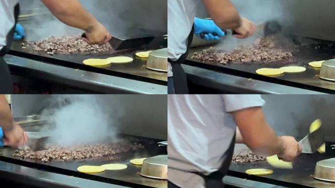 厨师在墨西哥餐厅做牛排玉米饼