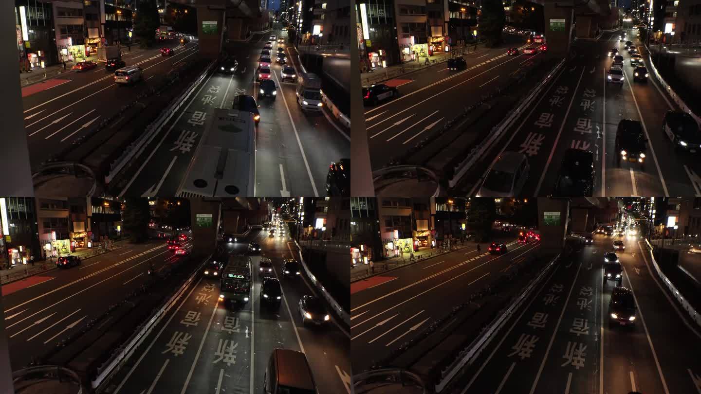 东京，日本:夜间街道交通的延时拍摄。