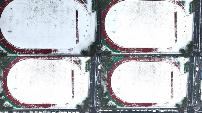 航拍大雪覆盖的学校操场