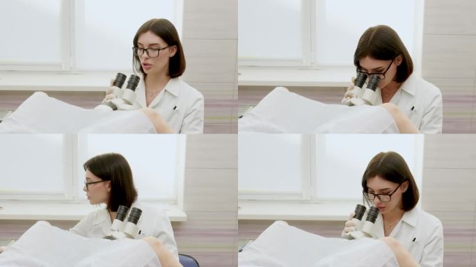 妇科办公室的病人和医生在做阴道镜检查。妇科医生通过数码阴道镜观察女性疾病。医学测试。