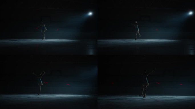 美女在冰上跳舞的剪影，女花样滑冰运动员在黑暗中滑冰，慢动作