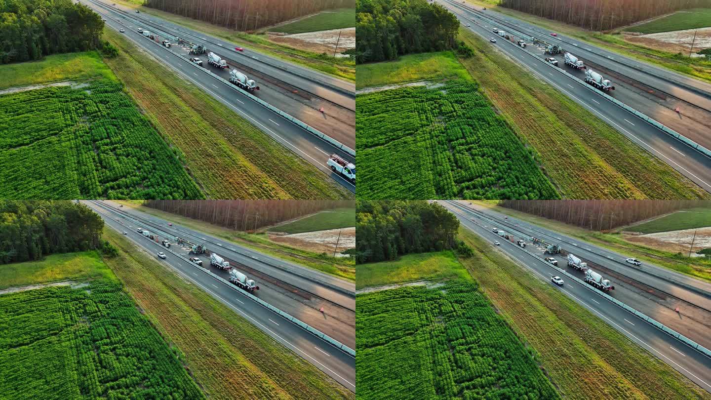 北卡罗来纳州高速公路正在进行道路施工。农田线拓宽了道路。航空镜头与静态相机运动