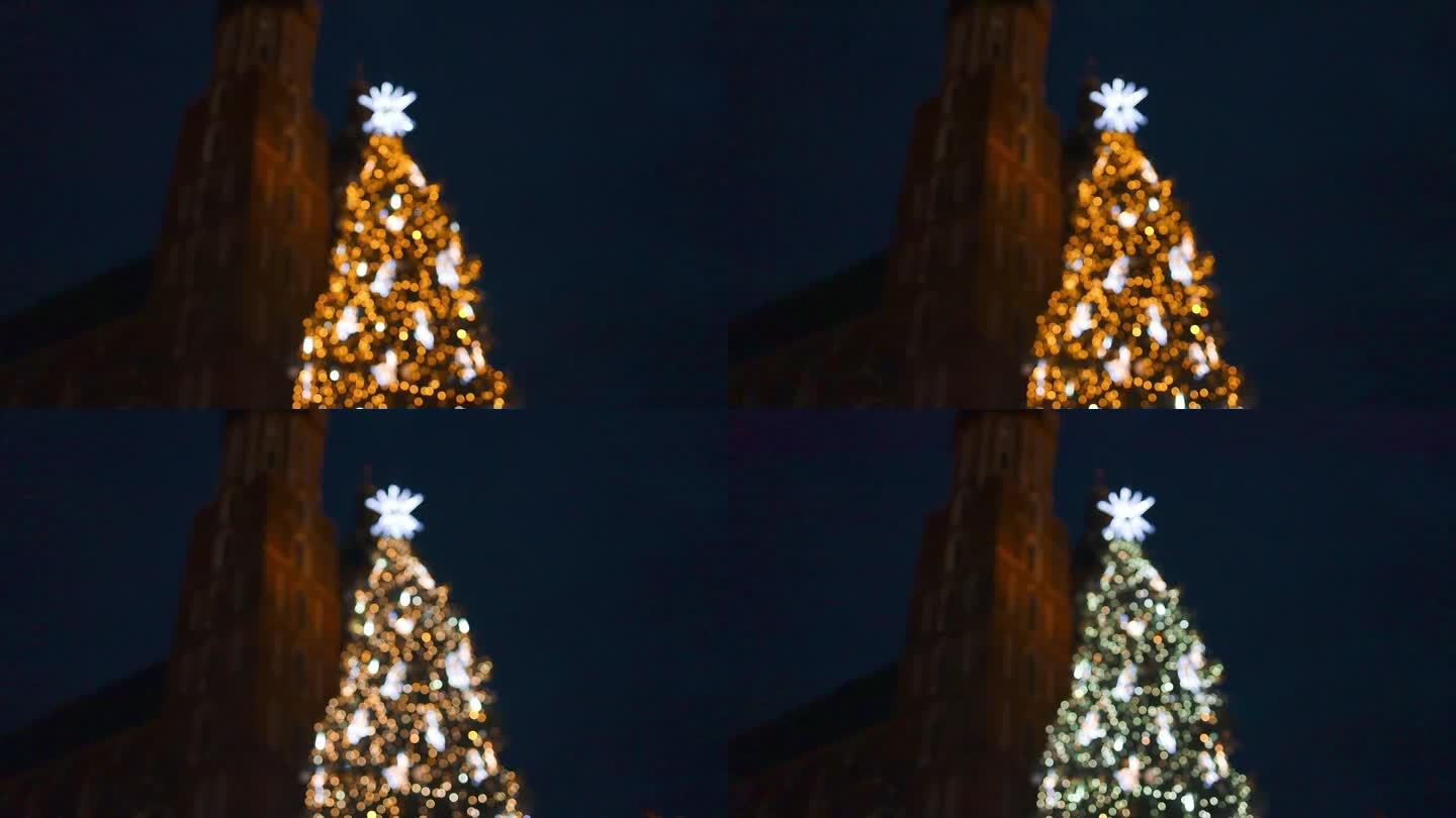 时尚的圣诞金饰和圣诞树。波兰克拉科夫的主广场和布衣厅在冬季的圣诞集市上装饰着圣诞树。