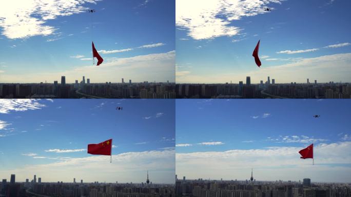 航拍无人机悬挂五星红旗飘扬在西安地标上空