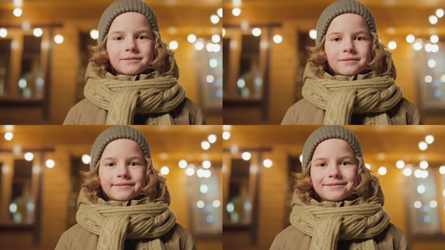 孩子穿着冬衣看着相机的肖像
