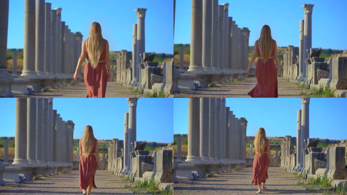 一名年轻女子参观位于土耳其安塔利亚的佩尔热古城遗址。这些废墟是这座城市丰富历史的见证，街道、建筑和建