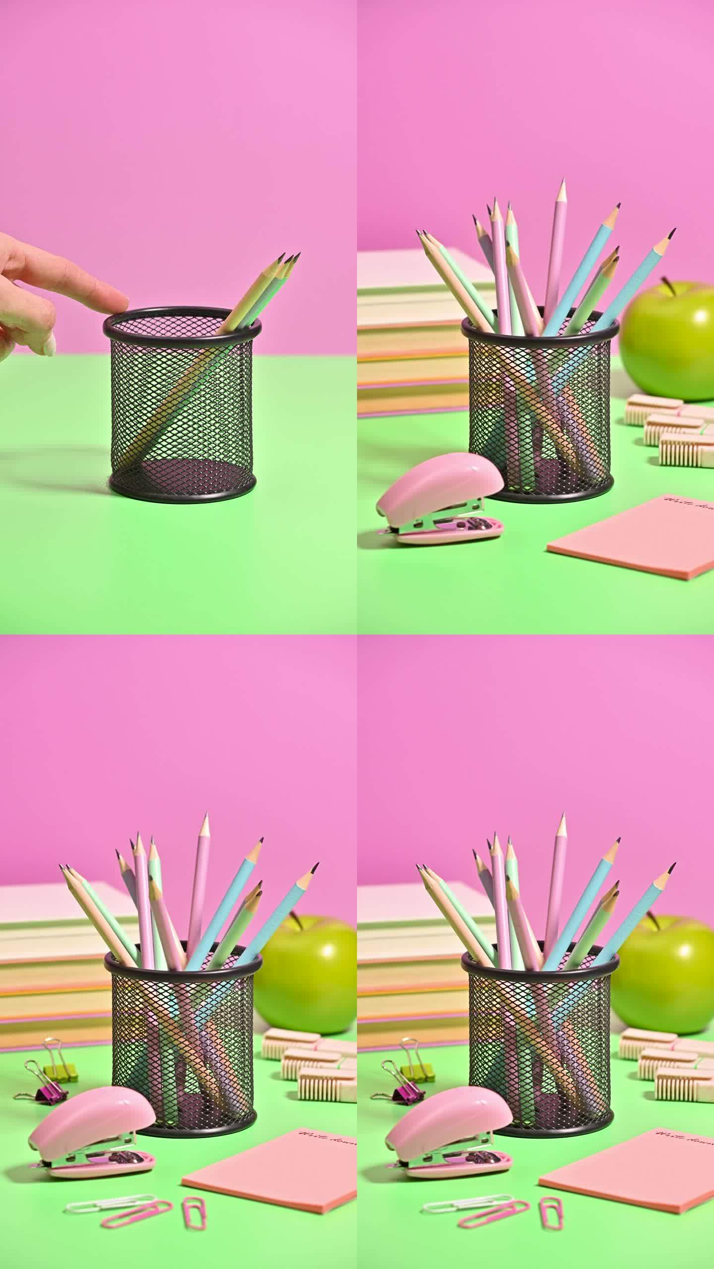 桌上出现的学校文具的粉彩灵感垂直停止运动