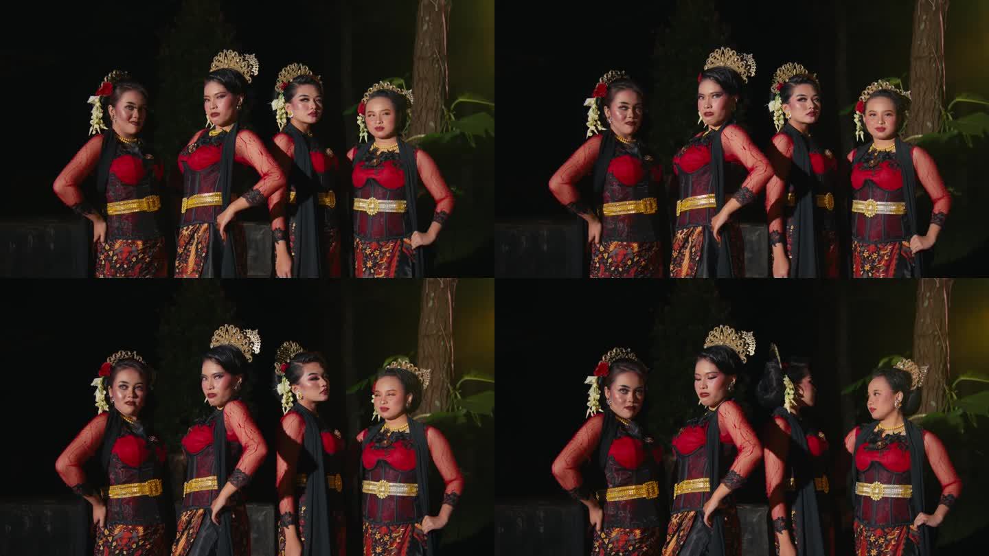 当一群印尼舞者看到其他舞者在舞台上跳舞时，他们看起来又生气又讨厌
