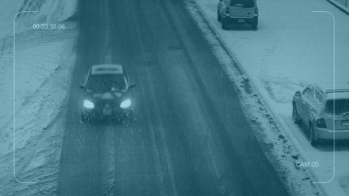 CCTV俯视图的汽车在下雪的道路