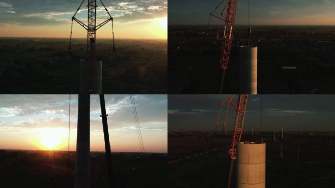风力发电混塔吊装黄昏氛围航拍4K高清