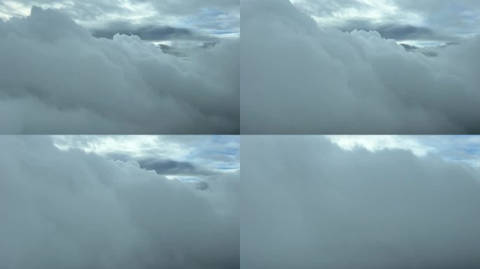 从飞机机舱拍摄的云景，这是飞行员在5000米高空实时飞行时看到的，这是一个多云的冬日。