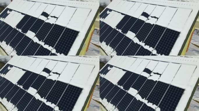 鸟瞰图，屋顶上覆盖着太阳能电池板，在冬季结束时，积雪融化，产生清洁能源。北方地区可再生电力低效率的概