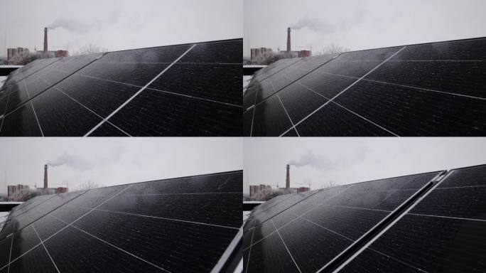 一种替代能源——前景中的太阳能电池板和传统能源——背景中的热电厂。替身。生产可再生能源的理念