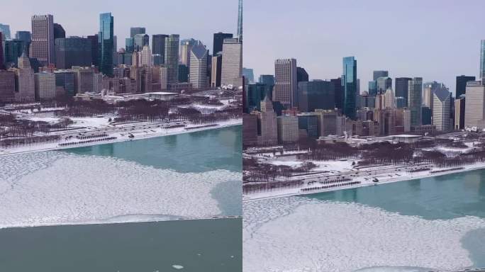 芝加哥和密歇根湖的摩天大楼在冬天的霜冻日。鸟瞰图。美国。垂直视频