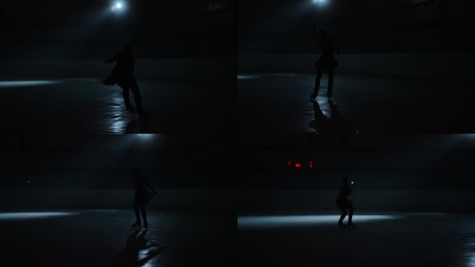 花样滑冰表演，黑暗中优雅女子花样滑冰运动员的剪影，才华横溢的女运动员