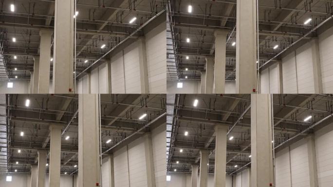 大型配送仓库的内部柱子和天花板。4k 50fps