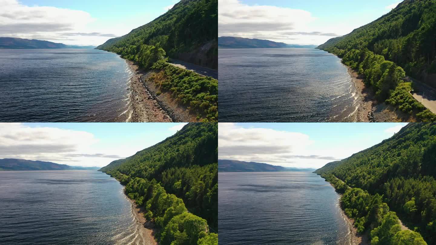 鸟瞰尼斯湖海岸与郁郁葱葱的绿色森林，苏格兰高地，苏格兰