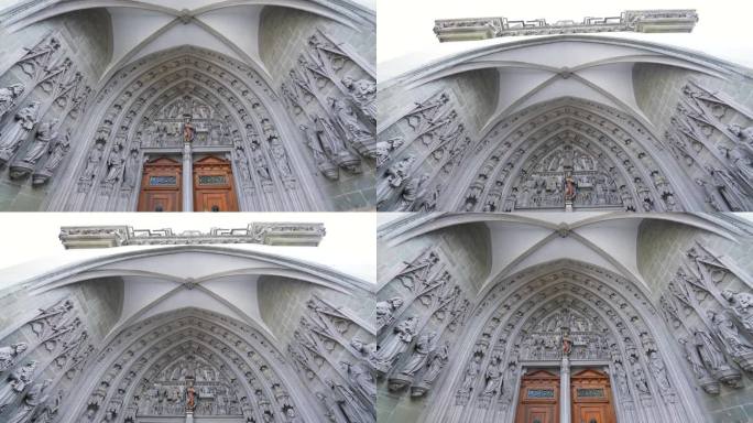 弗里堡，瑞士，大约2022年3月——古老传统的圣尼古拉斯大教堂入口，宗教门口