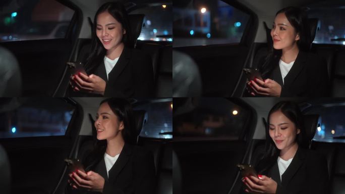 晚上坐在出租车后座系着安全带使用智能手机的女性的放松感。女开心在车里旅行，在去目的地的路上坐出租车。