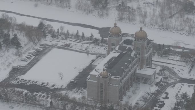 航拍威海高新区光威集团办公楼冬季雪景