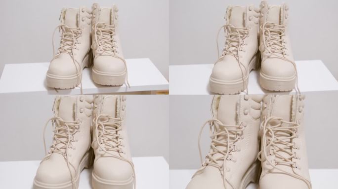 轻鞋女式长筒靴系带高底白色背景经典时尚秀秋冬鞋店购买米色乳白色