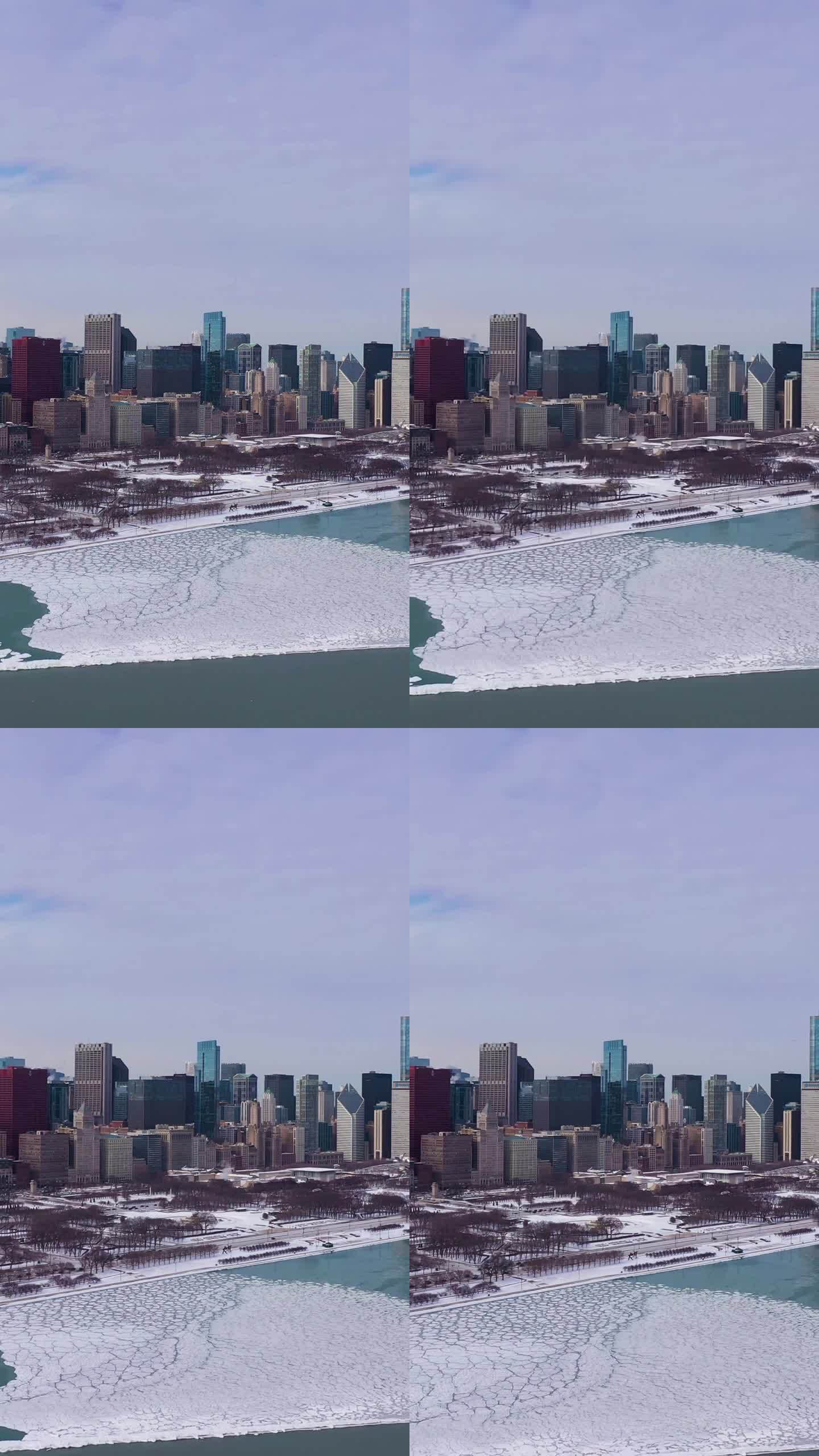 芝加哥的城市景观，密歇根湖在冬天的霜冻日。鸟瞰图。美国。垂直视频