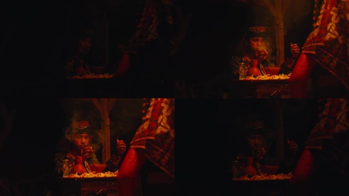 一个萨满正在桌子上用咒语和祭品进行仪式