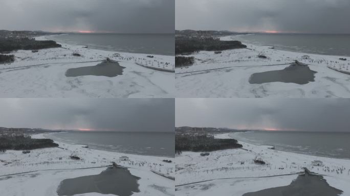 航拍威海小石岛湿地公园冬季雪后海岸风光