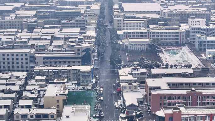 航拍乡镇雪景学校建筑田地大桥别墅河流房屋